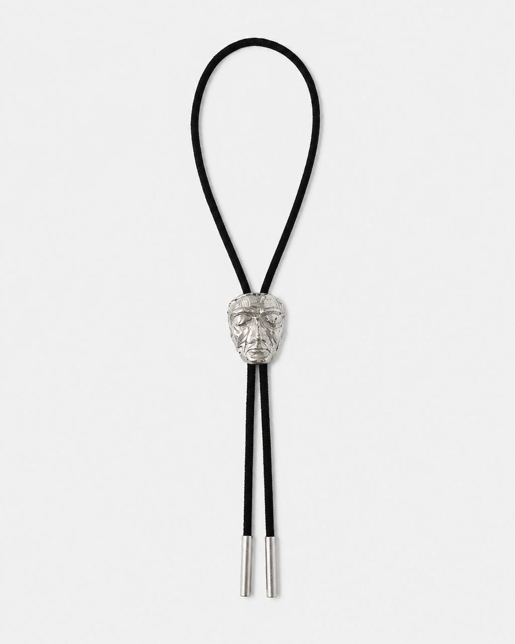 CARVED FACE BOLO TIE