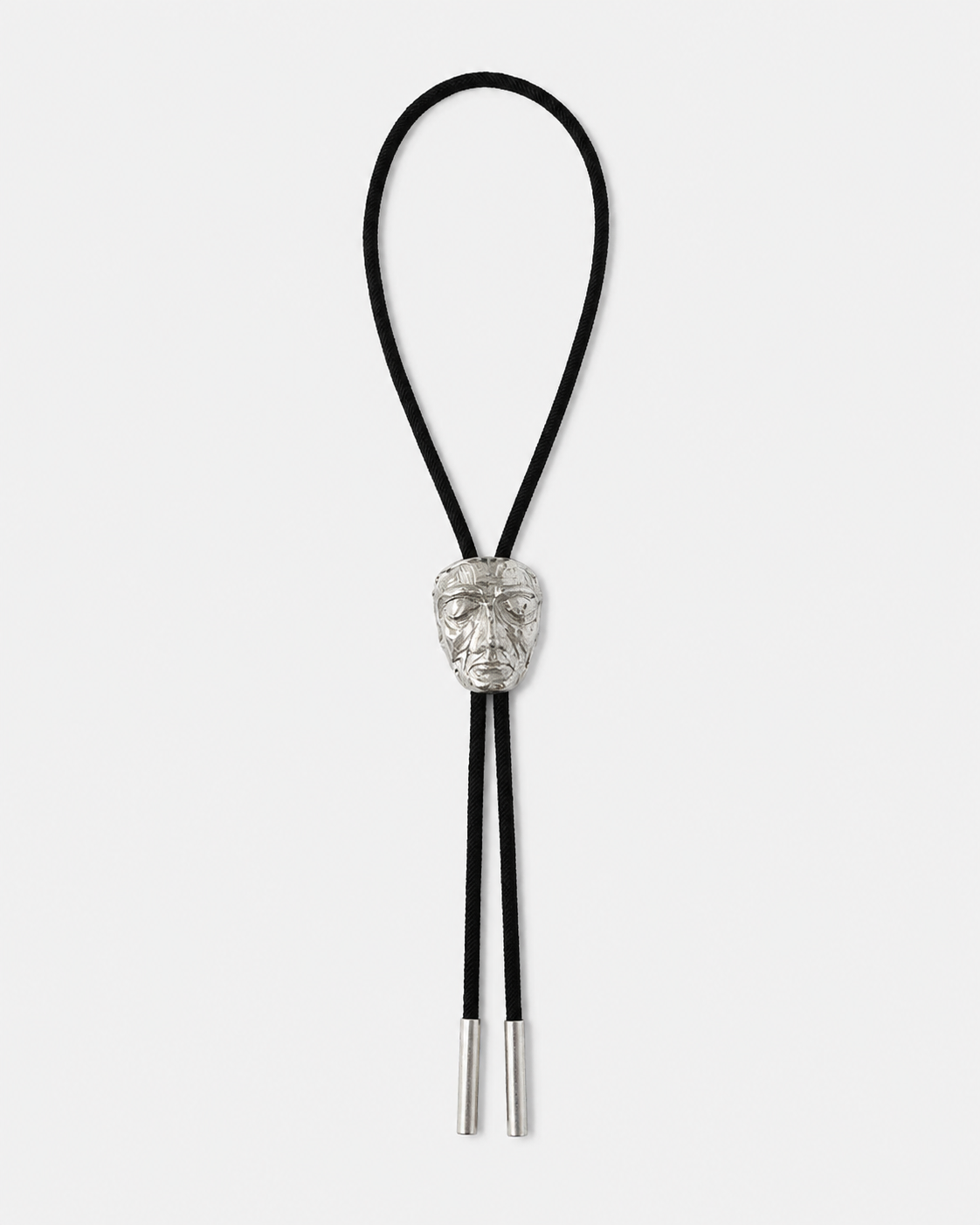 CARVED FACE BOLO TIE