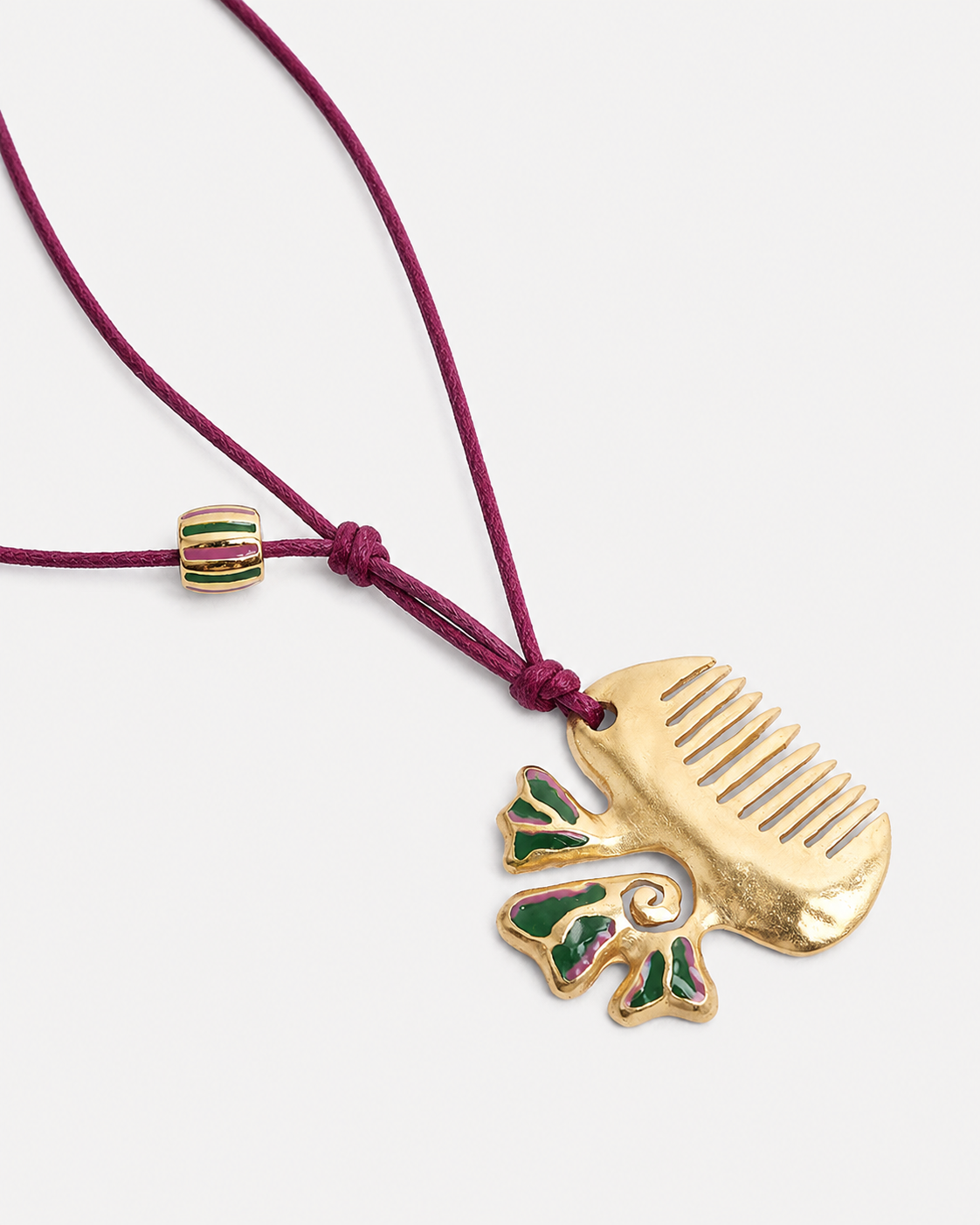 COMB BOW NECKLACE