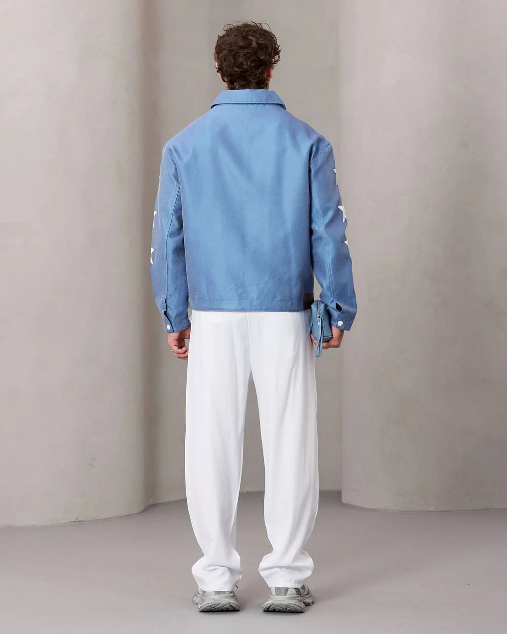 Blue jacket with white star details for men