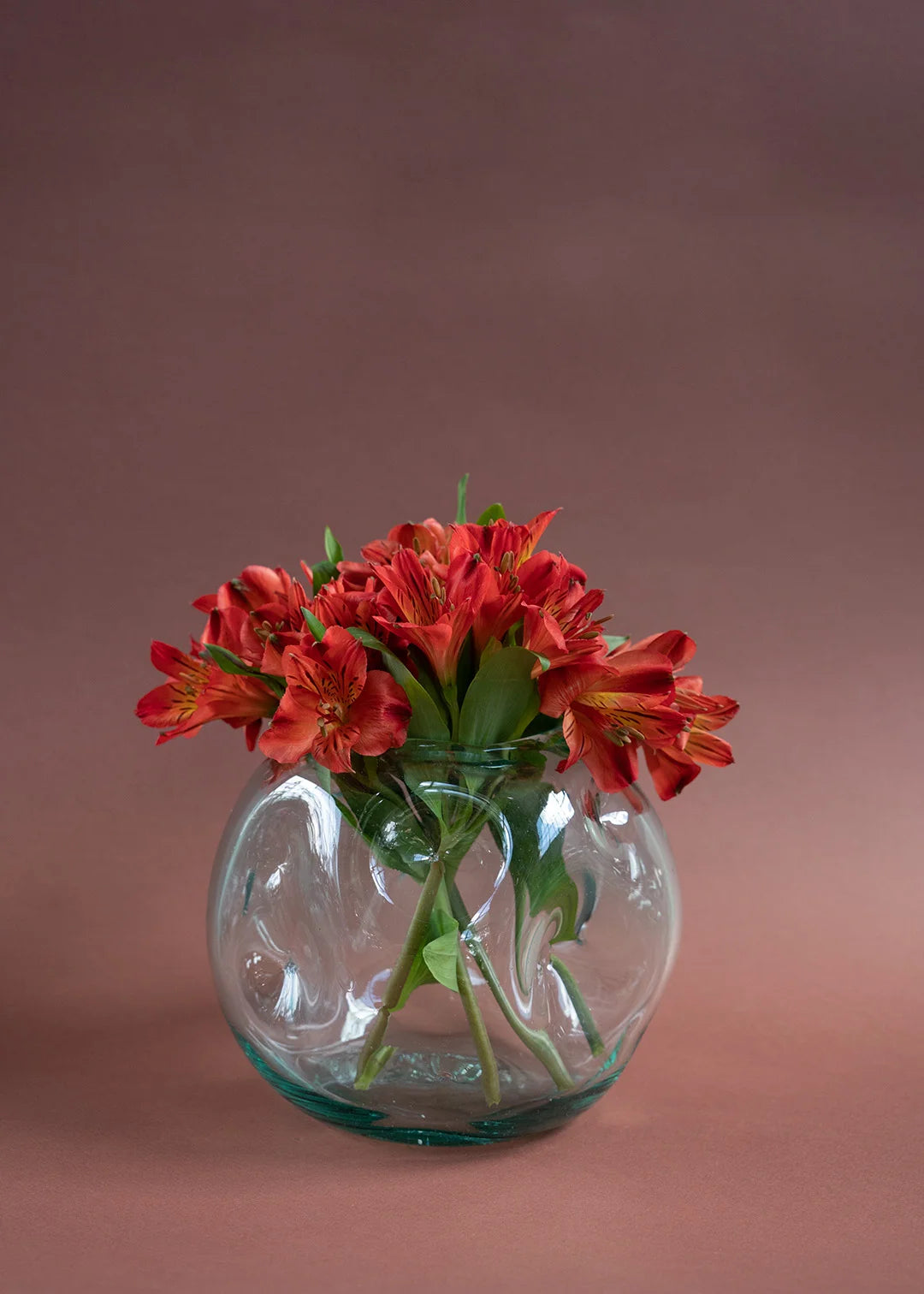 florero artesanal de vidrio reciclado verde hecho a mano diseño sostenible
PAISAJE LATINO