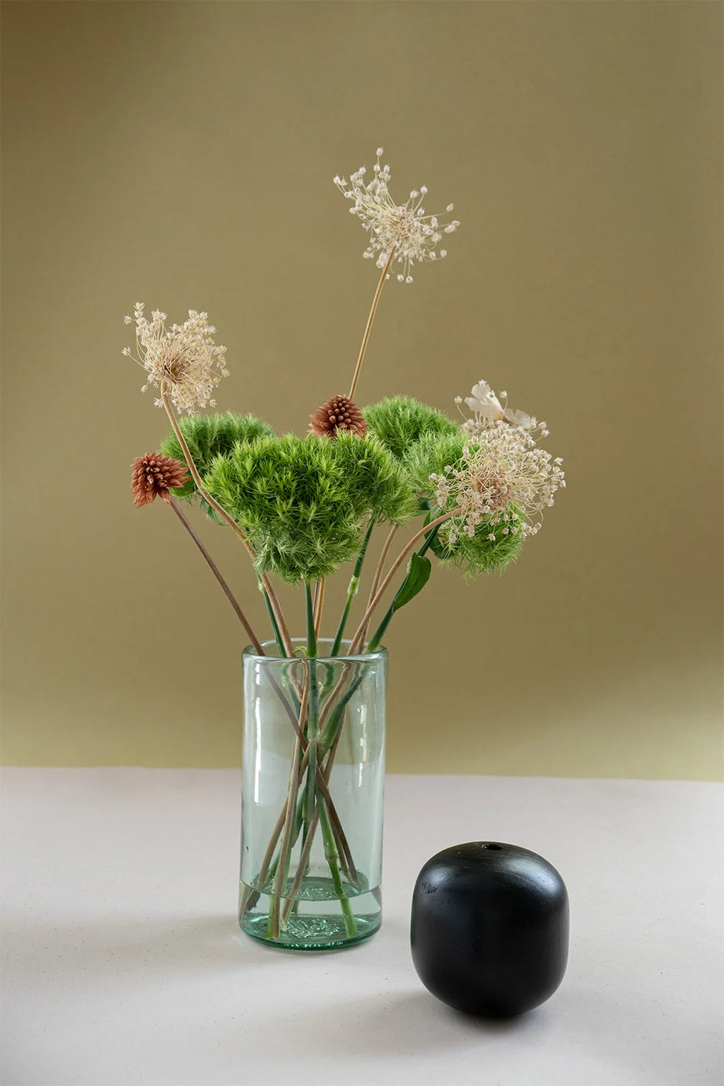 florero artesanal de vidrio reciclado verde hecho a mano diseño sostenible
PAISAJE LATINO