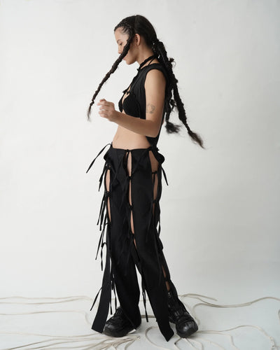 LONG STRIPED PANTS, KNOTS, AND SECRETS