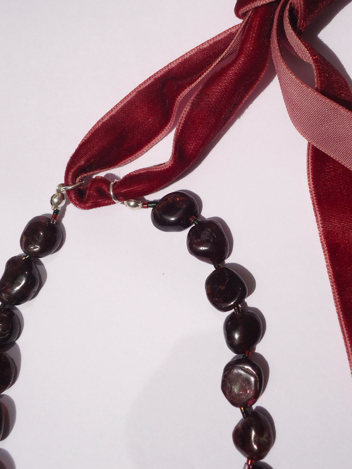 CALA AND GARNET NECKLACE