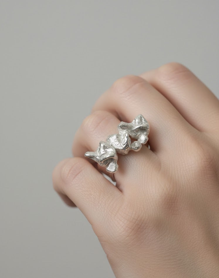 ANILLO TRES MUÑEQUITOS